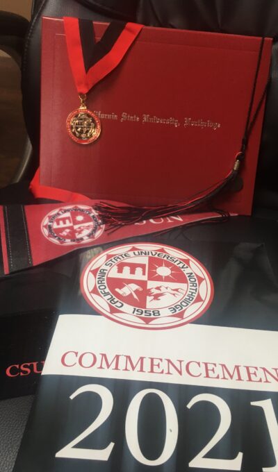 Adam exits CSUN with Honors